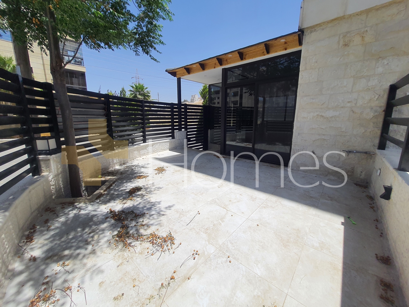 Ground floor apartment with terrace for rent in Qaryet AL-Nakheel 169m