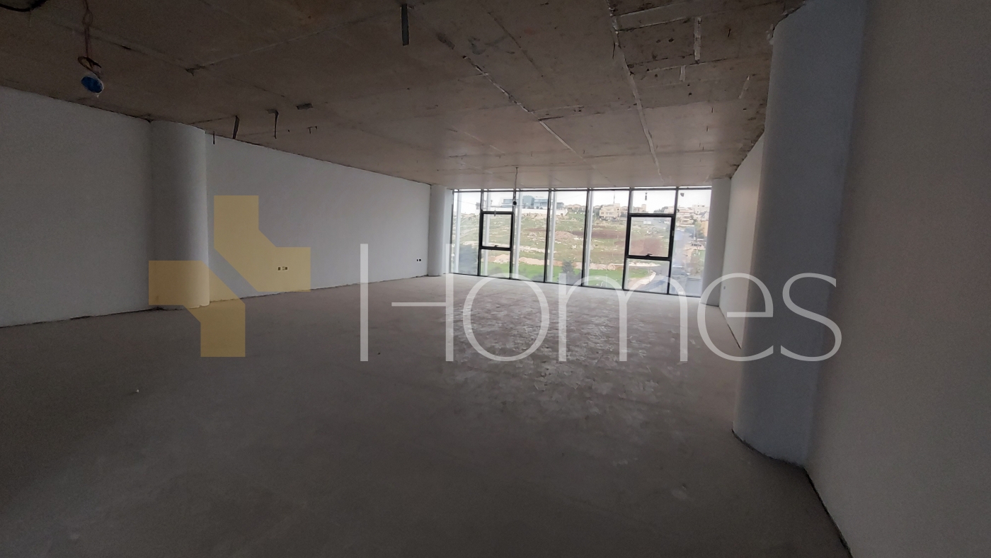 4th floor office with front facade windows for rent on Airport Road