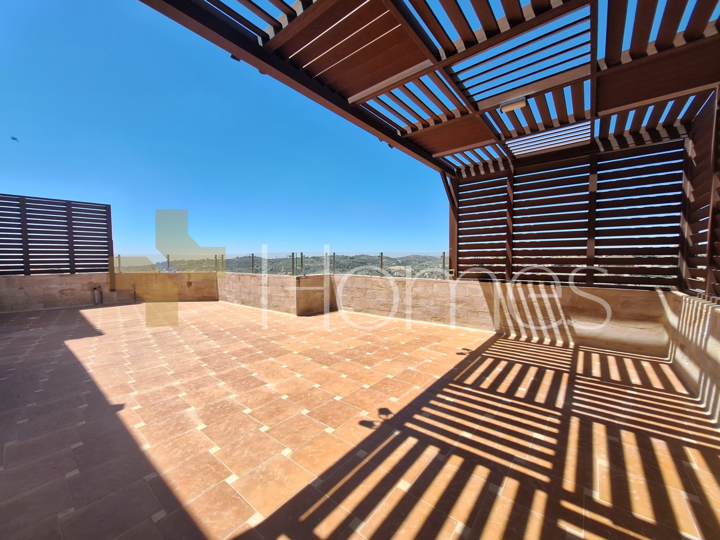 Roof apartment for rent in AL kursi with a building area of 210m