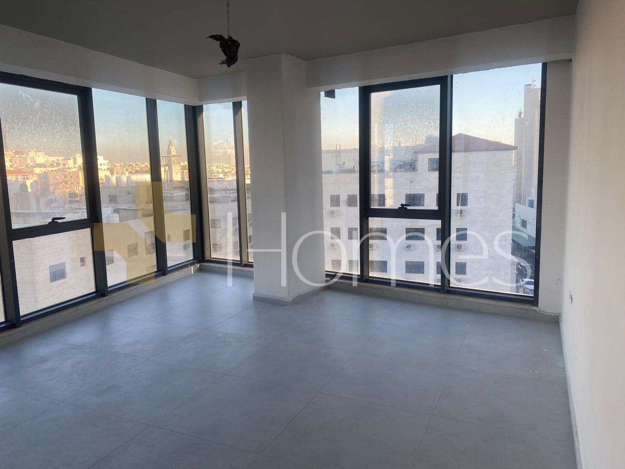 third floor office with a distinctive view of the street near 8th