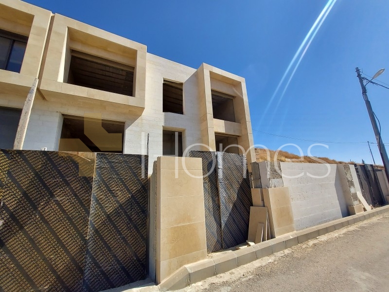 Unfinished villa for sale in Al Fuhais with a land area of 375m 