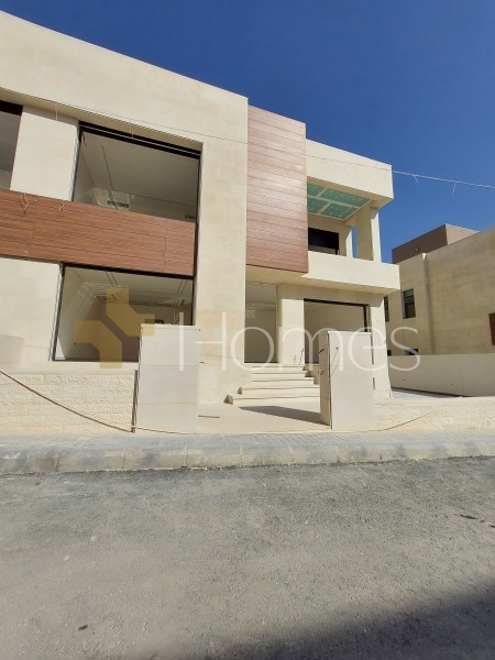 New villa under finishing for sale in Dabouq with a land area of 395m