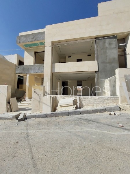 Modern villa for sale in Dabouq with a building area of 460m