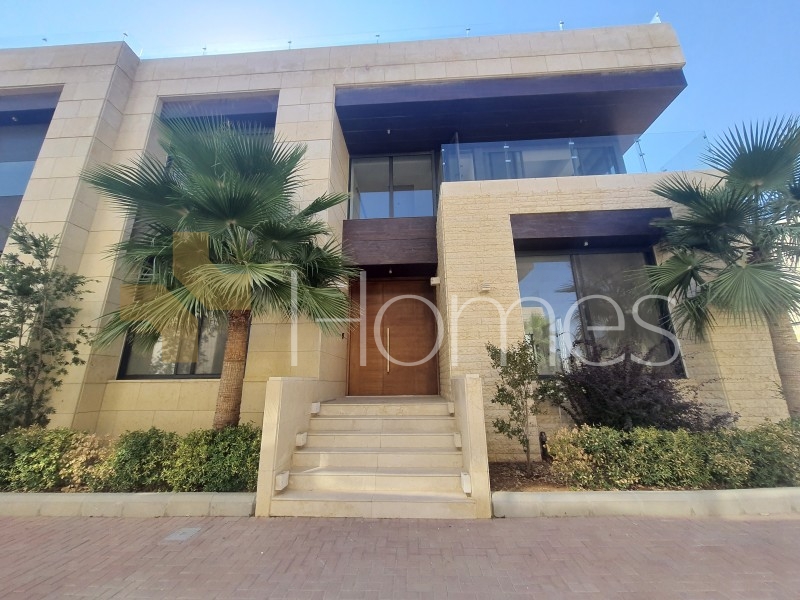 Attached villa for sale in Abdoun with a building area of 700m