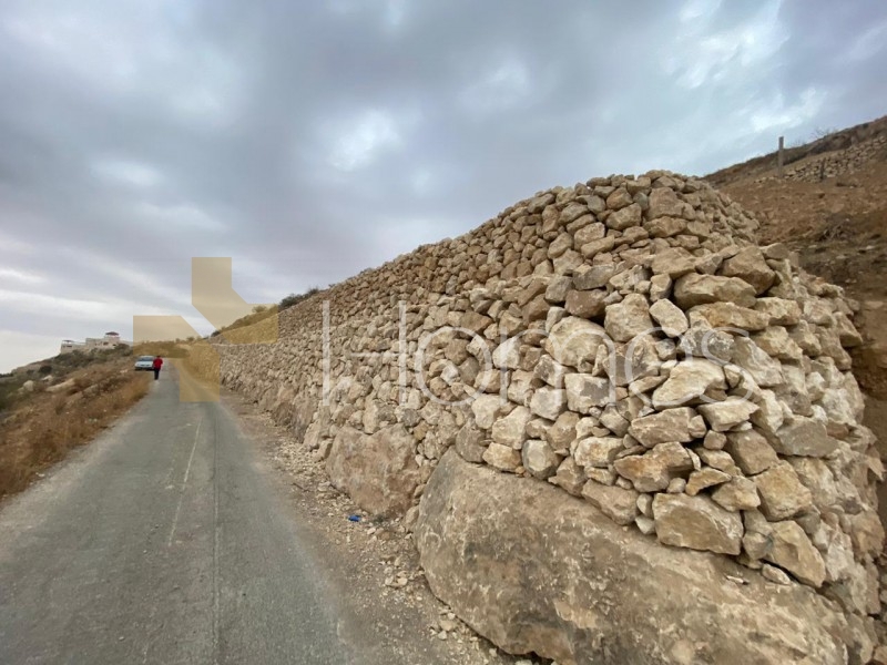 Land on two streets for sale in Al-Bahath area, with an area of 6,099m