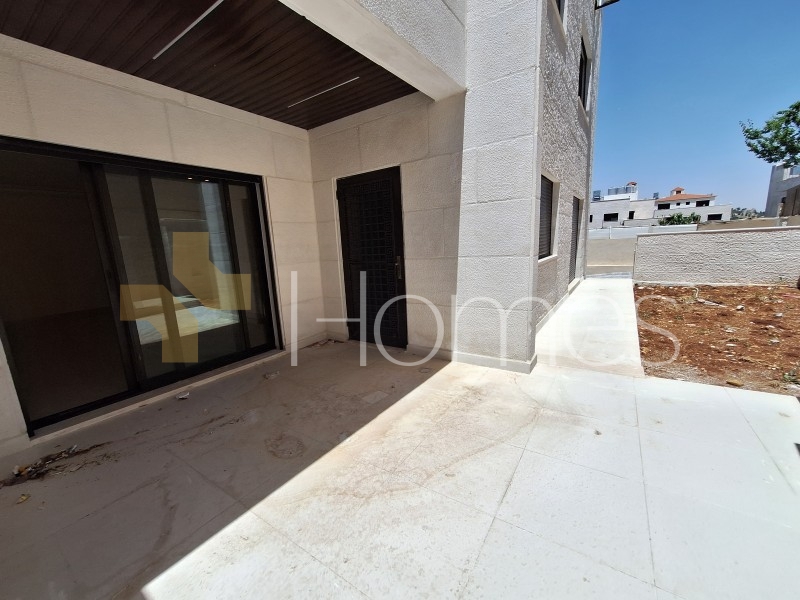 Apartment with a garden for sale in Al Fuhais 204m