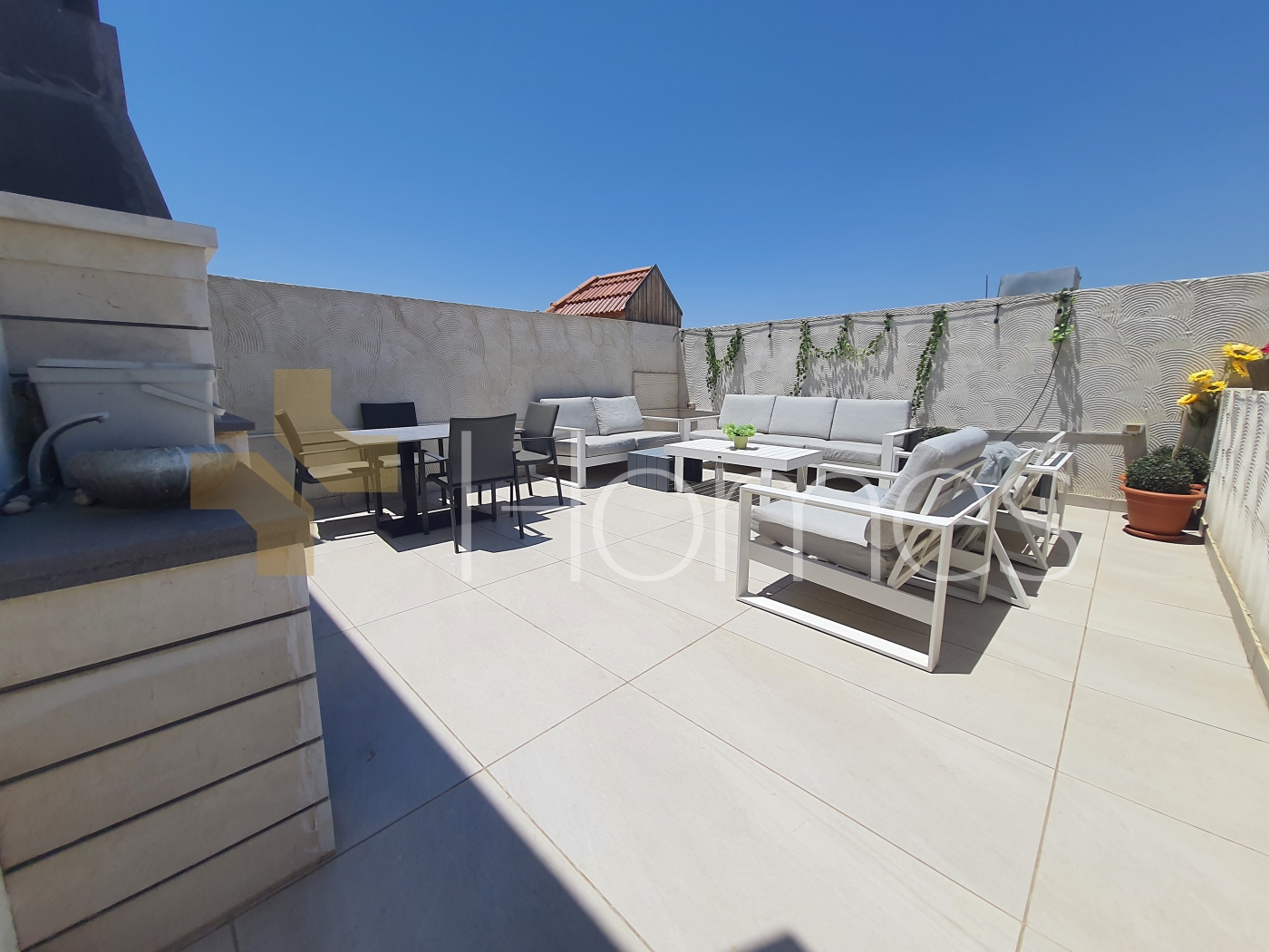 Duplex last floor with roof for sale in Qaryet Al Nakheel, area of 290m