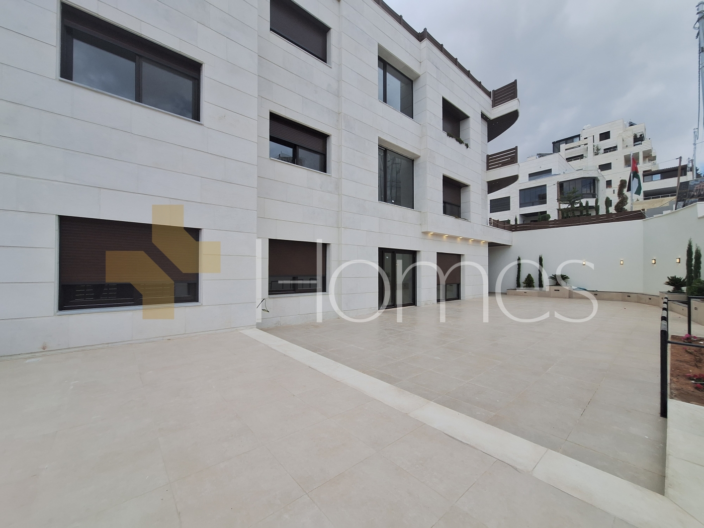Apartment with a garden for sale in Al Hummar 207m