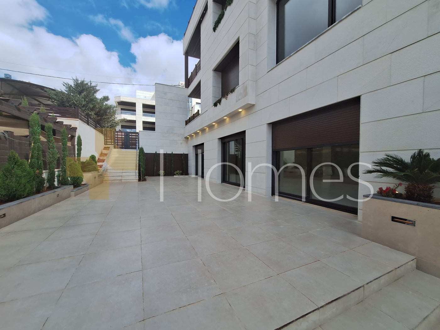 Apartment with a garden for sale in Al Hummar 207m