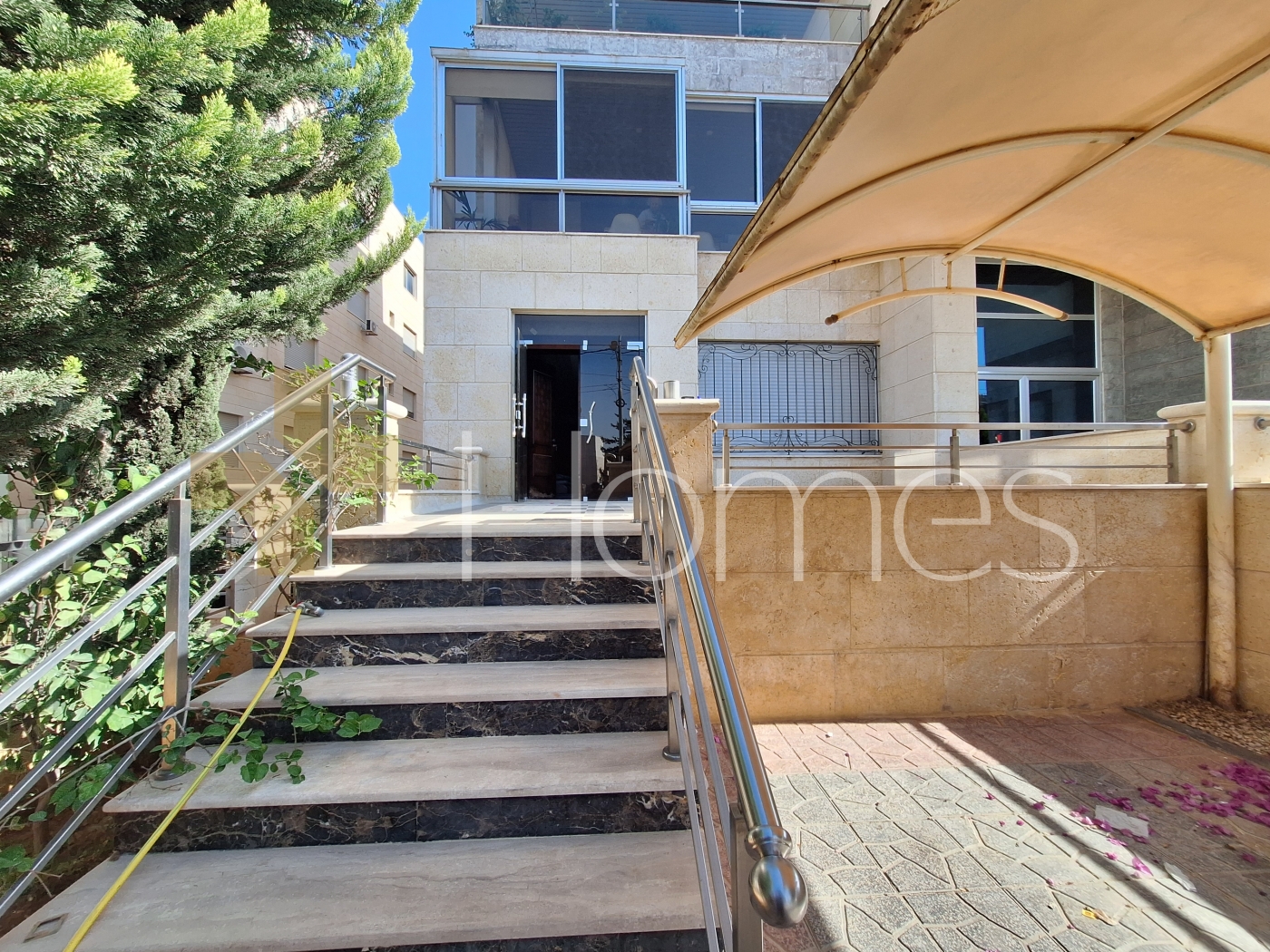 Ground floor apartment with private garage for sale in Umm Al Summaq