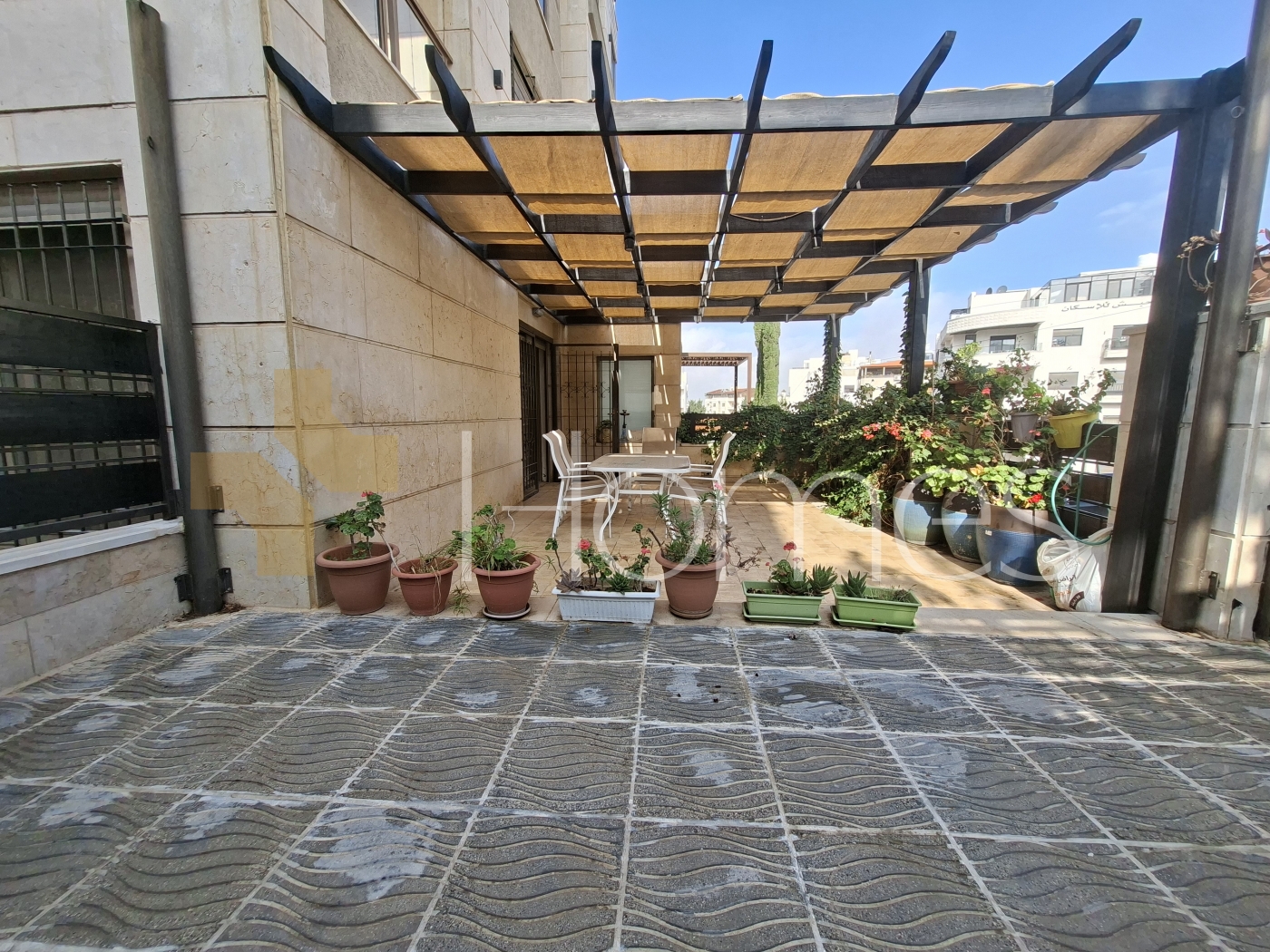 Furnished ground floor for sale in Qaryet AL-Nakheel, area of 200m