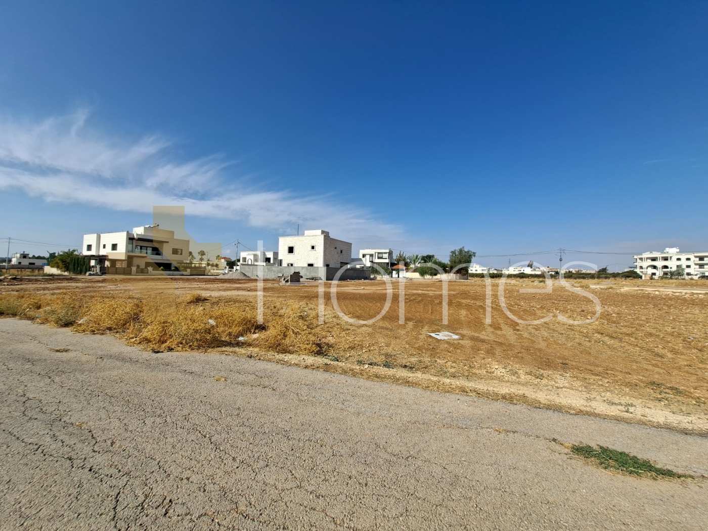 Land for sale suitable for building villa on airport road - Tunaib 713m