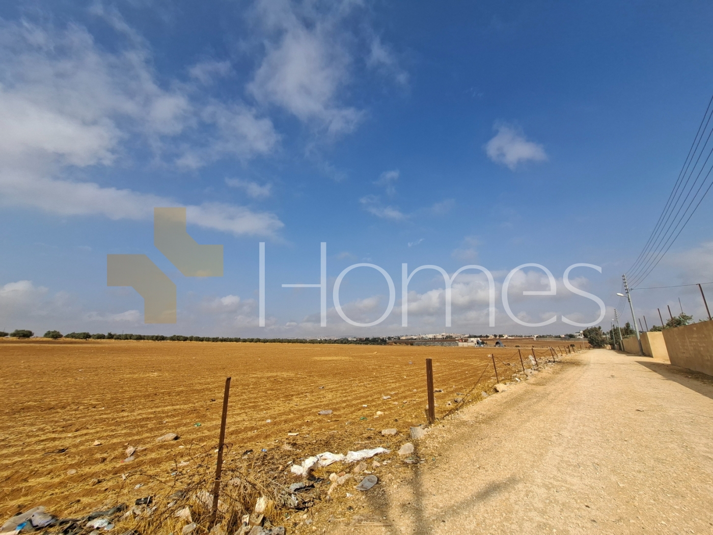Investment land for sale on Umm Al-Amad with a land area of 10,240m