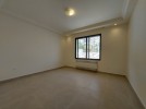  ground floor with garden for rent in Sweifieh building area of 220m