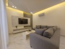 شقة مع ترس لم تسكن  للايجار في ام اذينة بمساحة بناء 100م 