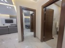 شقة مع ترس لم تسكن  للايجار في ام اذينة بمساحة بناء 100م 