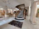 Standalone villa for rent in Tlaa Al Ali with a building area of 1075m