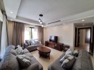 شقة ارضية مع ترس للايجار في عبدون بمساحة بناء 110م