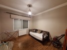 شقة طابق ثاني للإيجار في ضاحية الامير راشد بمساحة بناء 150م