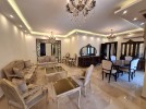 شقة ارضية مفروشة للايجار في عبدون بمساحة بناء 240م