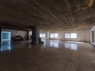 Unfinished office in a luxurious building for rent in Wadi Saqra, 500m