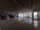 Unfinished office with glass facades for rent in Wadi Saqra, of 400m