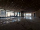 Unfinished office with glass facades for rent in Wadi Saqra, of 400m