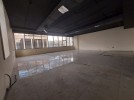 مكتب طابق اول بواجهات زجاجية  للايجار في الدوار السابع، بمساحة 180م