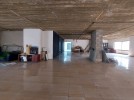 Half-floor office in a luxurious building for rent in Wadi Saqra, 500m