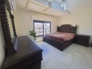 First floor apartmt for rent in Qaryet Al Nakheel, an area of 200m