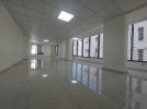 مكتب طابق ثاني طابقي بواجهات زجاجية للايجار في الشميساني، مساحة المكتب 250م