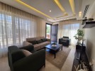 Ground floor apartment with terrace for rent in Abdoun 100m