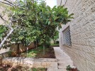 Ground floor apartment with a garden for rent in Khalda 360m