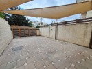 Ground floor apartment with a garden for rent in Khalda 360m
