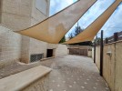 Ground floor apartment with a garden for rent in Khalda 360m
