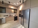 Second floor apartment for rent in Abdoun Hills 145m