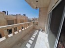 Third floor apartment with a high view for rent in Deir Ghbar 216m 