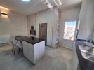 Third floor apartment with a high view for rent in Deir Ghbar 216m 