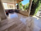 Ground floor with a garden for rent in Marj El Hamam, an area of 230m