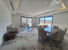 Duplex last floor apartment with a roof for rent in Dair Ghbar 300m
