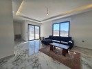 Duplex last floor apartment with a roof for rent in Dair Ghbar 300m