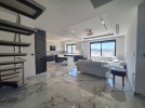 Duplex last floor apartment with a roof for rent in Dair Ghbar 300m