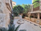 Apartment with a garden for rent in Dair Ghbar 350m
