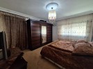 Apartment with a garden for rent in Dair Ghbar 350m