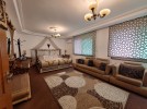 Apartment with a garden for rent in Dair Ghbar 350m