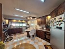 Apartment with a garden for rent in Dair Ghbar 350m