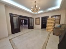  شقة ارضية طابقية مع حديقة للايجار في خلدا بمساحة بناء 460م