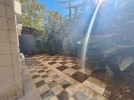 Apartment with a garden for rent in Abdoun 186m