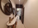 Ground floor apartment with a garden for rent in Khalda 250m