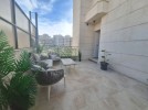 ground floor apartment with a terrace for rent in Deir Ghbar 95m